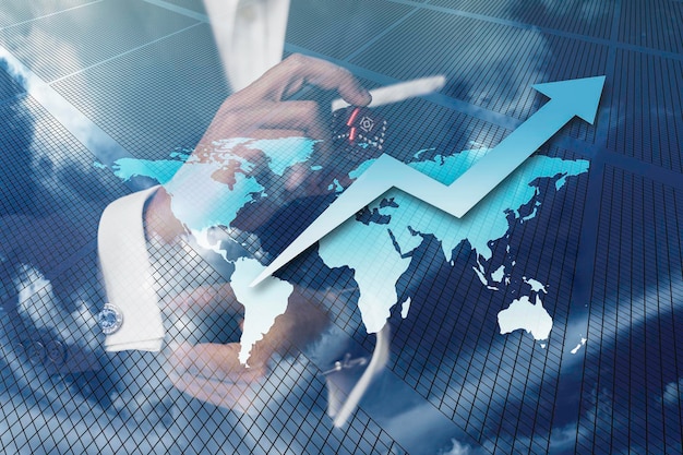 Empresario con mapa mundial y gráfico. Concepto de asociación comercial internacional.