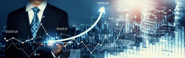 Empresario que trabaja con el gráfico de negocios de finanzas digitales de tecnología perceptiva