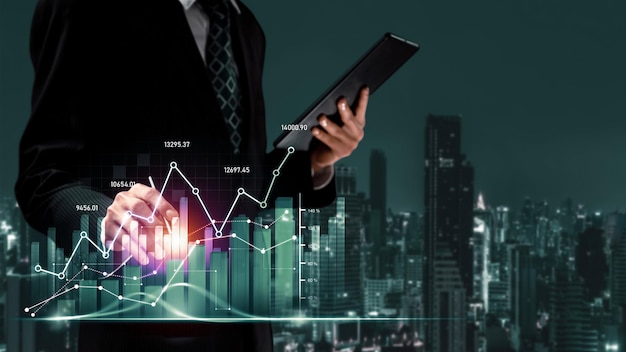 Empresario que trabaja con el gráfico de negocios de finanzas digitales de tecnología perceptiva