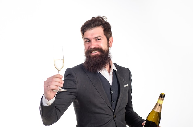 Empresário segurando garrafa e taça de champanhe, desejos de felicidades champanhe homem de terno corporativo