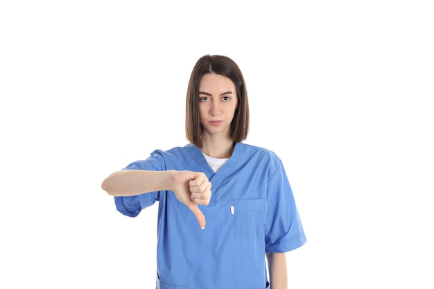 Enfermera en formación femenina aislado sobre fondo blanco.