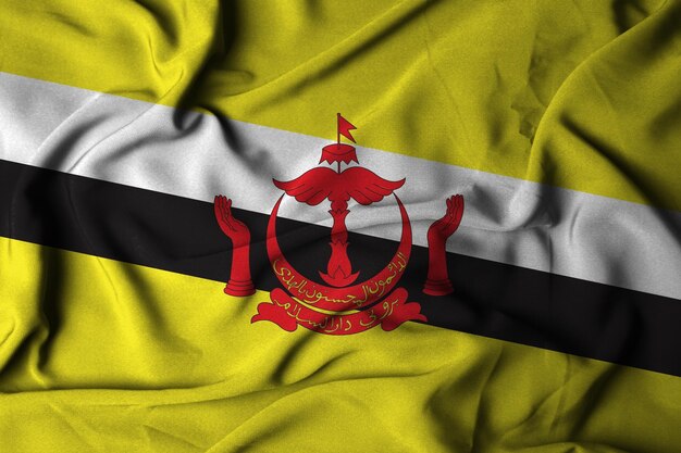 Enfoque selectivo de la bandera de brunei darussalam con ilustración 3D de textura de tela ondeante