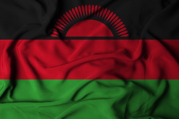 Enfoque selectivo de la bandera de malawi, con textura de tela ondeante. ilustración 3d