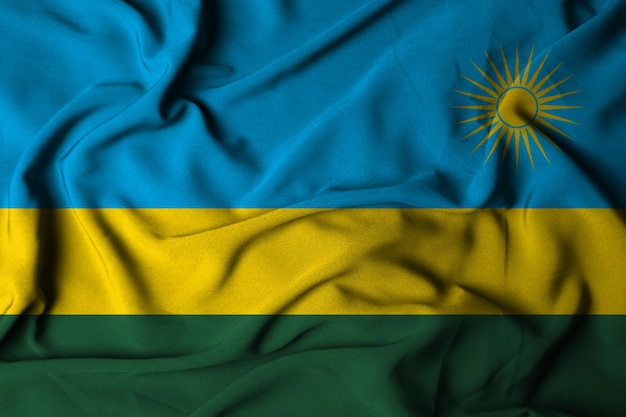 Enfoque selectivo de la bandera de ruanda, con textura de tela ondeante. ilustración 3d
