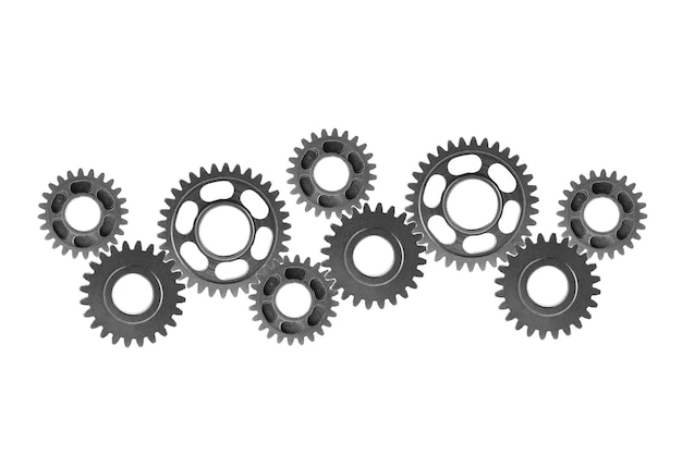 Engranaje metálico aislado sobre fondo blanco para el concepto de negocio de trabajo en equipo de automóviles y bicicletas con motor