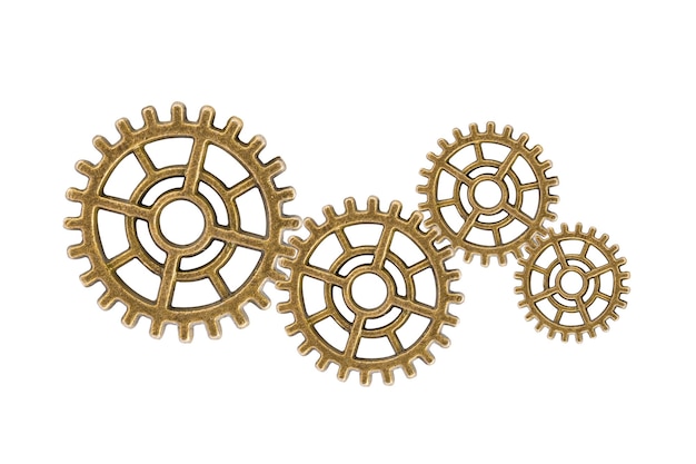 Engrenagem e rodas dentadas isoladas em um mecanismo de relógio de fundo branco motor de metal de latão industrial