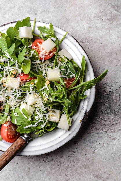 ensalada con rúcula y melón