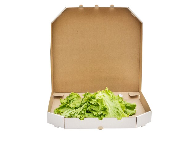 Foto ensalada verde en la caja de pizza concepto de alimentación saludable