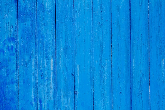 envelhecido grunge resistiu a textura de madeira de porta azul
