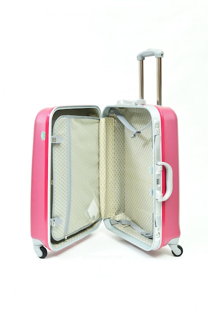 Un equipaje rosa abierto que muestra las funciones dentro
