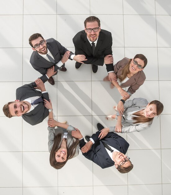 Foto equipe de negócios de vista superior em um círculofoto com espaço de cópia