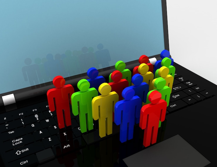 Foto equipo de figuras de personas en la computadora portátil, 3d rindió la ilustración