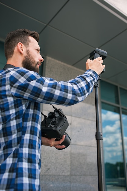 Foto equipo de fotografía cámara fotógrafo backstage