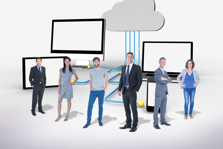 Foto equipo de negocios contra dispositivos de medios que se conectan a través de la computación en la nube