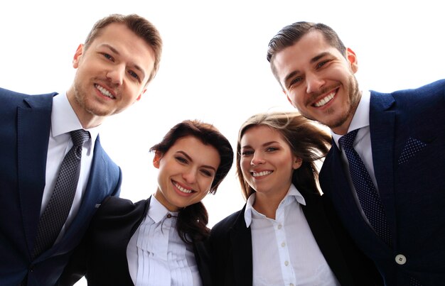 Equipo de negocios sonriente feliz