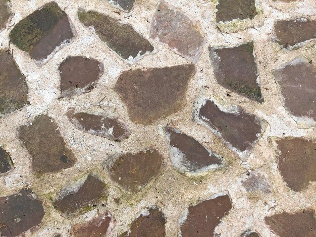 Erstklassiger abstrakter Hintergrund der Steinmauer