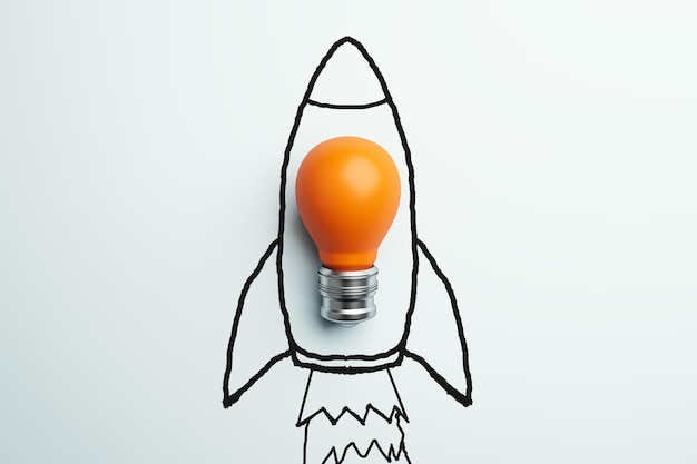 Esbozo creativo de una nave espacial y lámpara naranja sobre fondo blanco Iniciar nuevas ideas de negocio y lanzar el concepto de renderización 3D