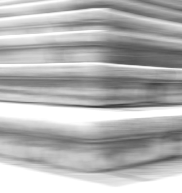 Escaleras verticales de color blanco brillante desenfoque de fondo de abstracción como telón de fondo