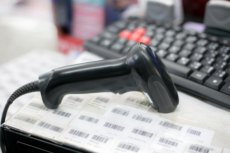 Foto escáner de código de barras en la imagen borrosa en supermercados