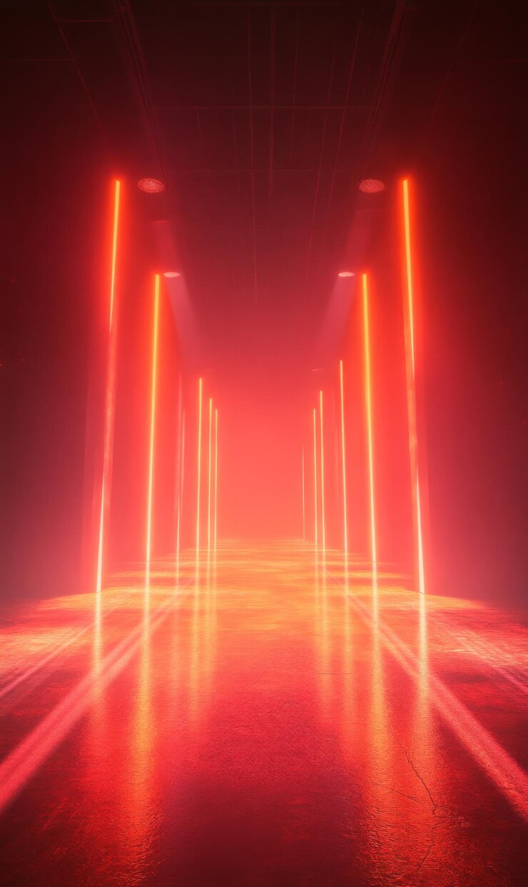 Un escenario futurista con luces rojas y naranjas vibrantes que iluminan el piso.