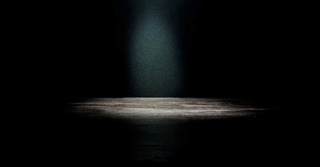 Un escenario vacío y oscuro con una luz en el centro Un concepto publicitario para su producto