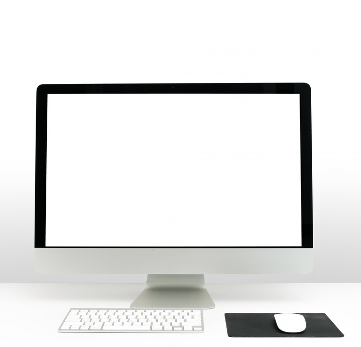 Foto escritorio de oficina con pc.