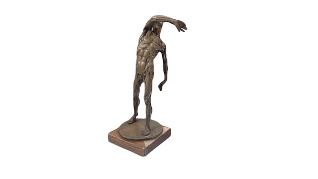 Una escultura de bronce de un hombre con la palabra deporte.