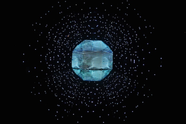 Esfera geométrica azul brillante futurista con partículas flotantes