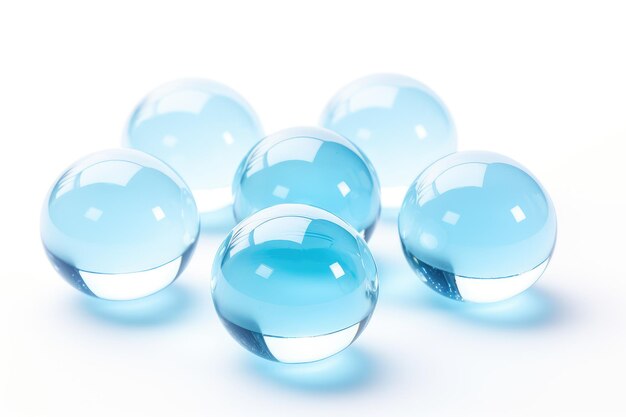 Foto esferas de vidrio con reflejos azules suaves flotando