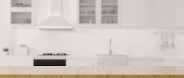 Un espacio de copia en la mesa de comedor de madera sobre un fondo de cocina blanco de lujo moderno y borroso