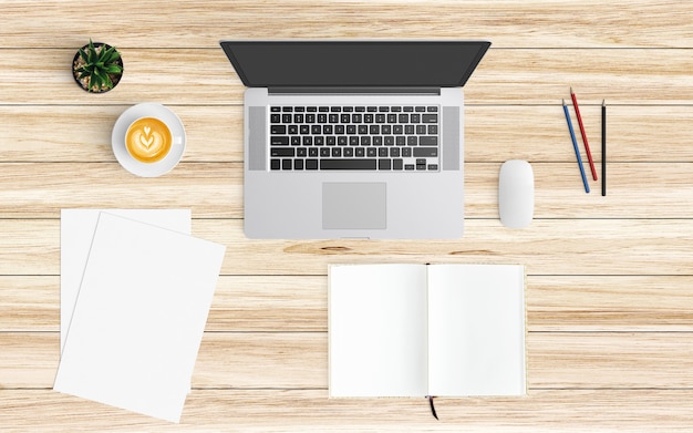 Espacio de trabajo moderno con taza de café, papel, cuaderno, tableta o teléfono inteligente y computadora portátil en madera