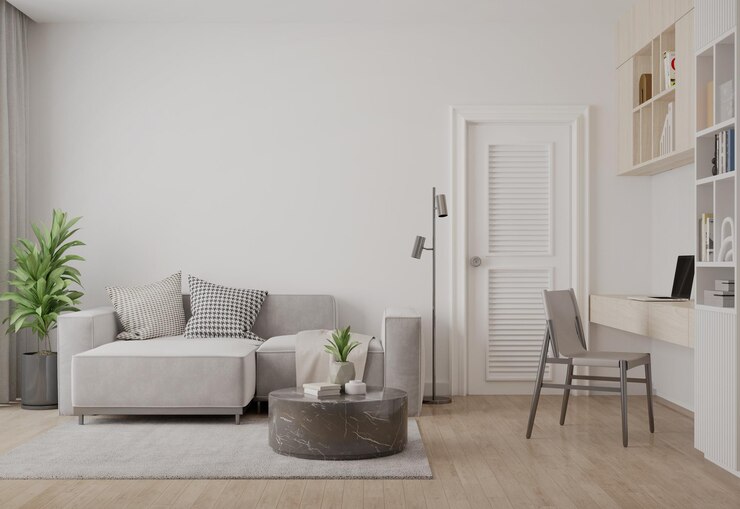 Espacio de vivienda y trabajo en habitación blanca
