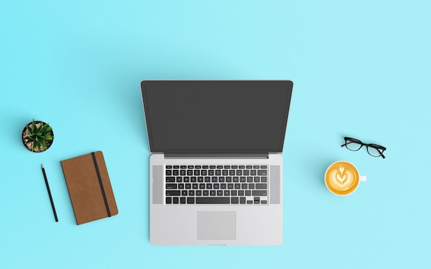 Espaço de trabalho moderno com xícara de café, notebook, smartphone e laptop na cor azul
