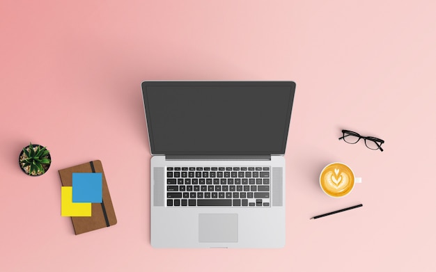 Espaço de trabalho moderno com xícara de café, notebook, smartphone e laptop na cor rosa