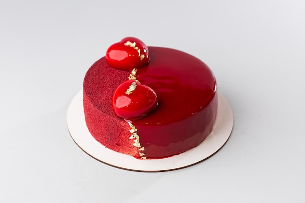 Espejo rojo semiesmaltado y entremets de velour con mini corazones y dorado