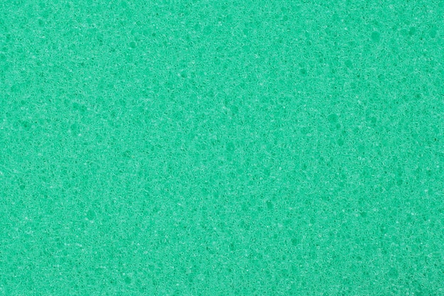 Foto esponja de espuma de celulosa de textura verde
