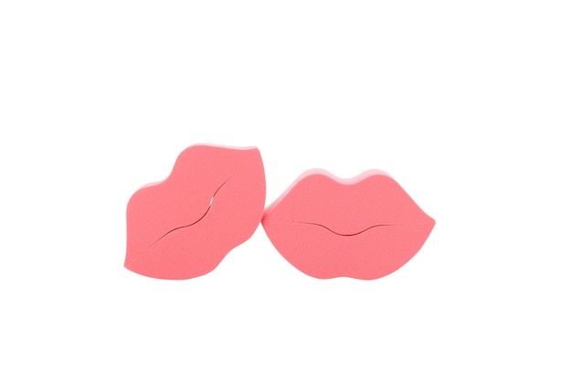 Esponjas de maquillaje PNG en forma de labios aisladas sobre fondo blanco