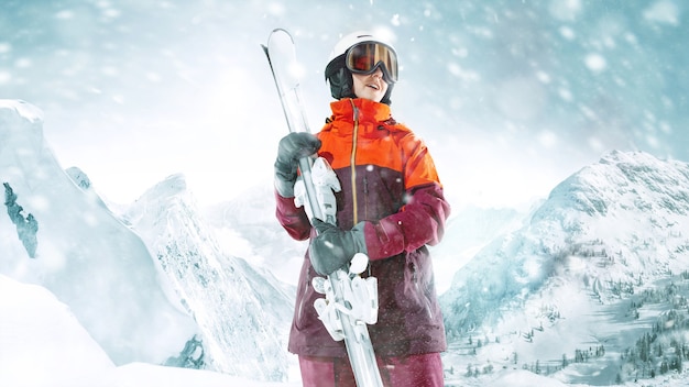 Esquiador femenino de pie con el cielo en una mano sobre fondo de paisaje de montaña hermosa. Invierno, esquí, nieve, vacaciones, deporte, ocio, concepto de estilo de vida