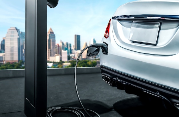 Estación de carga de vehículos eléctricos para coche eléctrico en concepto de energía verde y energía ecológica