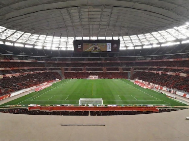 Estádio de futebol com as bancadas cheias