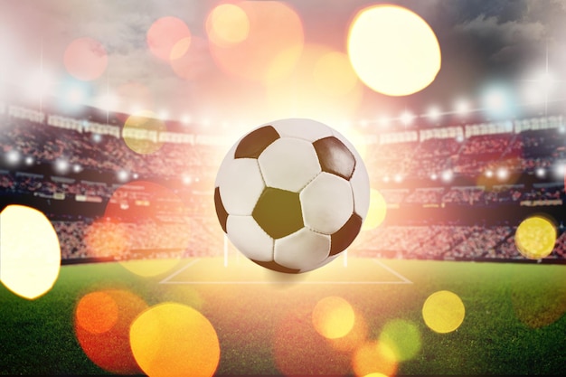 Estadio de fútbol americano iluminado, espacio en blanco