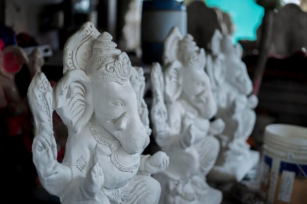 Estátua de Lord Ganesha mantida em uma loja antes do foco seletivo de Ganesh Chaturthi