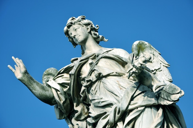 Foto estatua de mármol del ángel italia