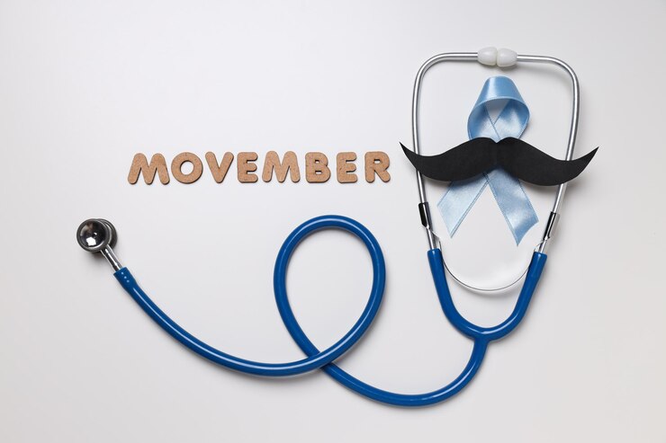 Estetoscopio con bigote de papel y cinta azul, concepto Movember