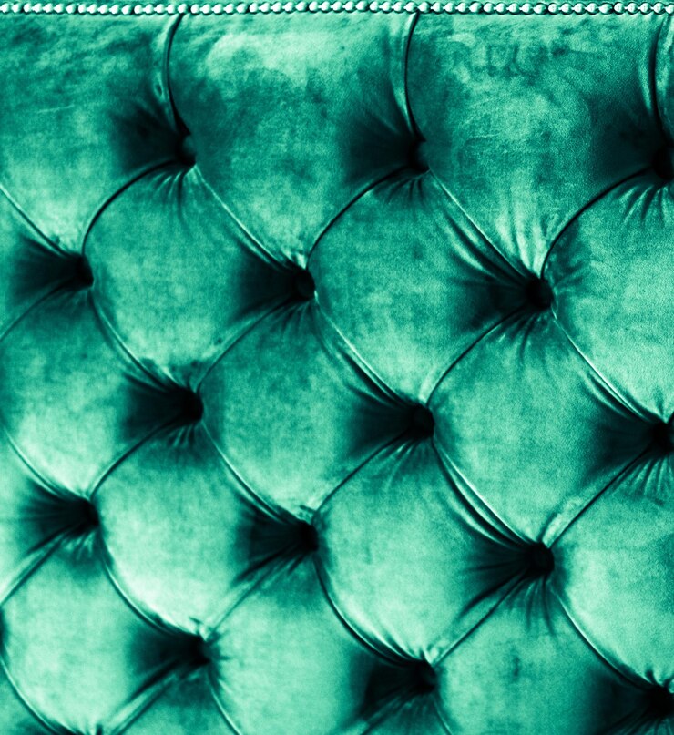 Foto estofamento de sofá acolchoado de veludo de luxo esmeralda com botões, textura e fundo de decoração verde elegante