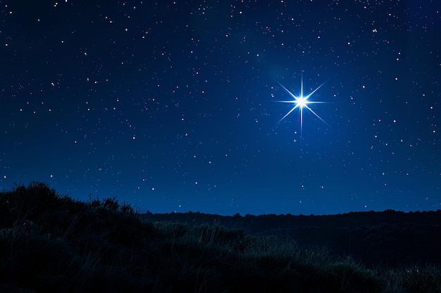 Foto estrela brilhante no céu azul escuro da noite