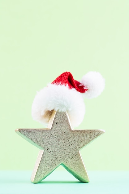 Foto estrela de natal em fundo de cor pastel