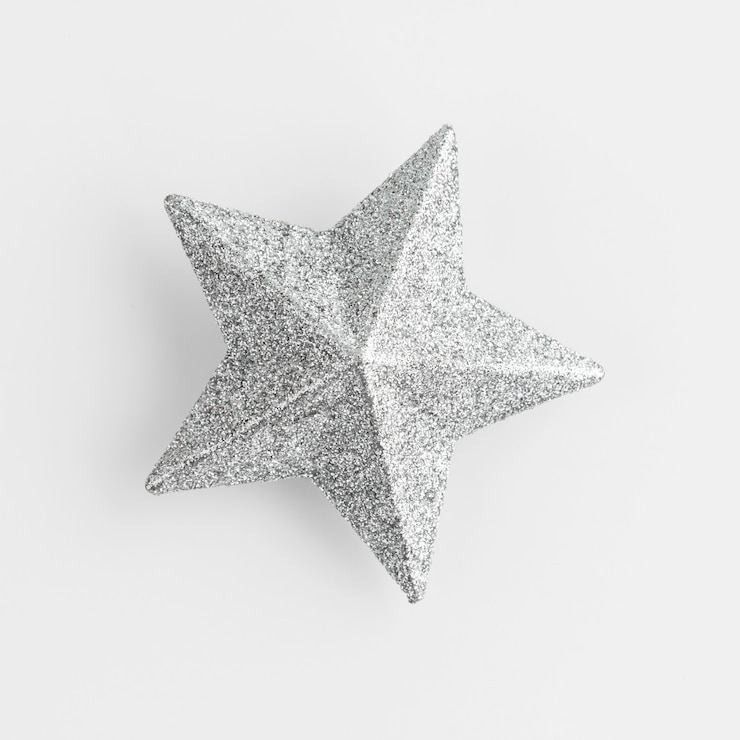 Foto estrela prateada brilhante em branco