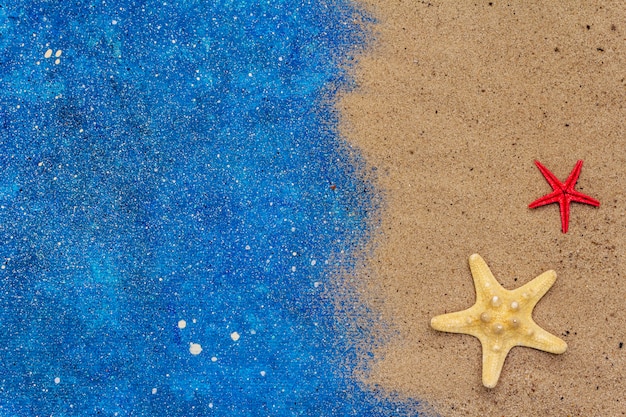 Estrelas do mar, areia e glitter