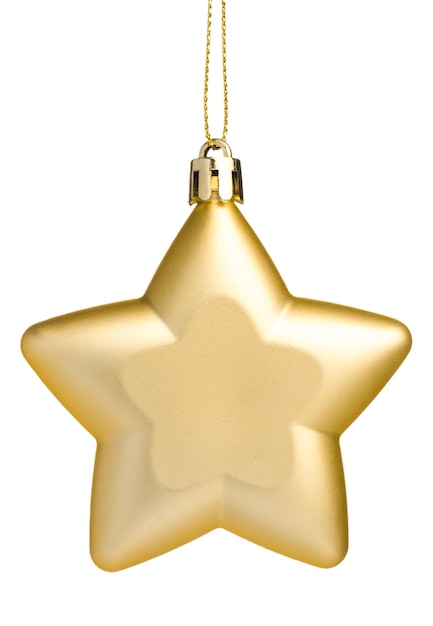 Foto estrella de oro del juguete del árbol de navidad en fondo blanco aislado